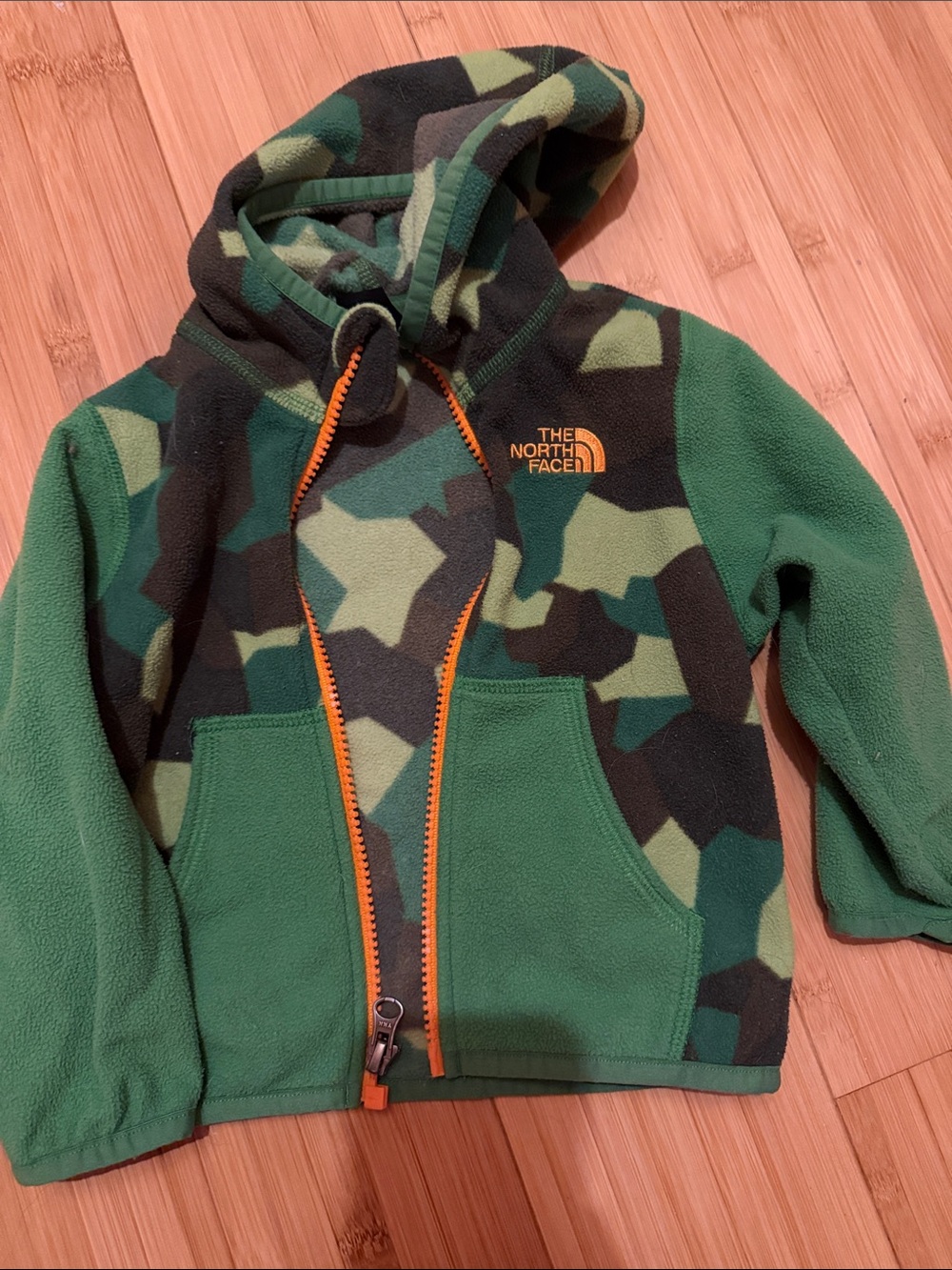 The North Face Kids Green Camo Fleece Hoodie with Orange Zip